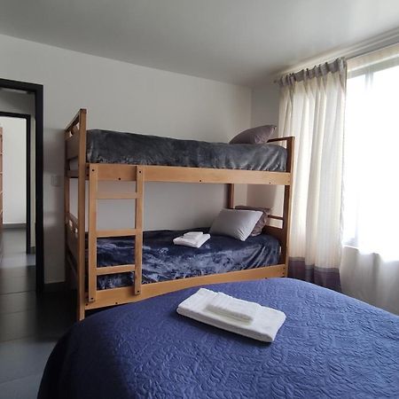 Elegante apartamento con vistas al volcán Tunguraua Baños Habitación foto